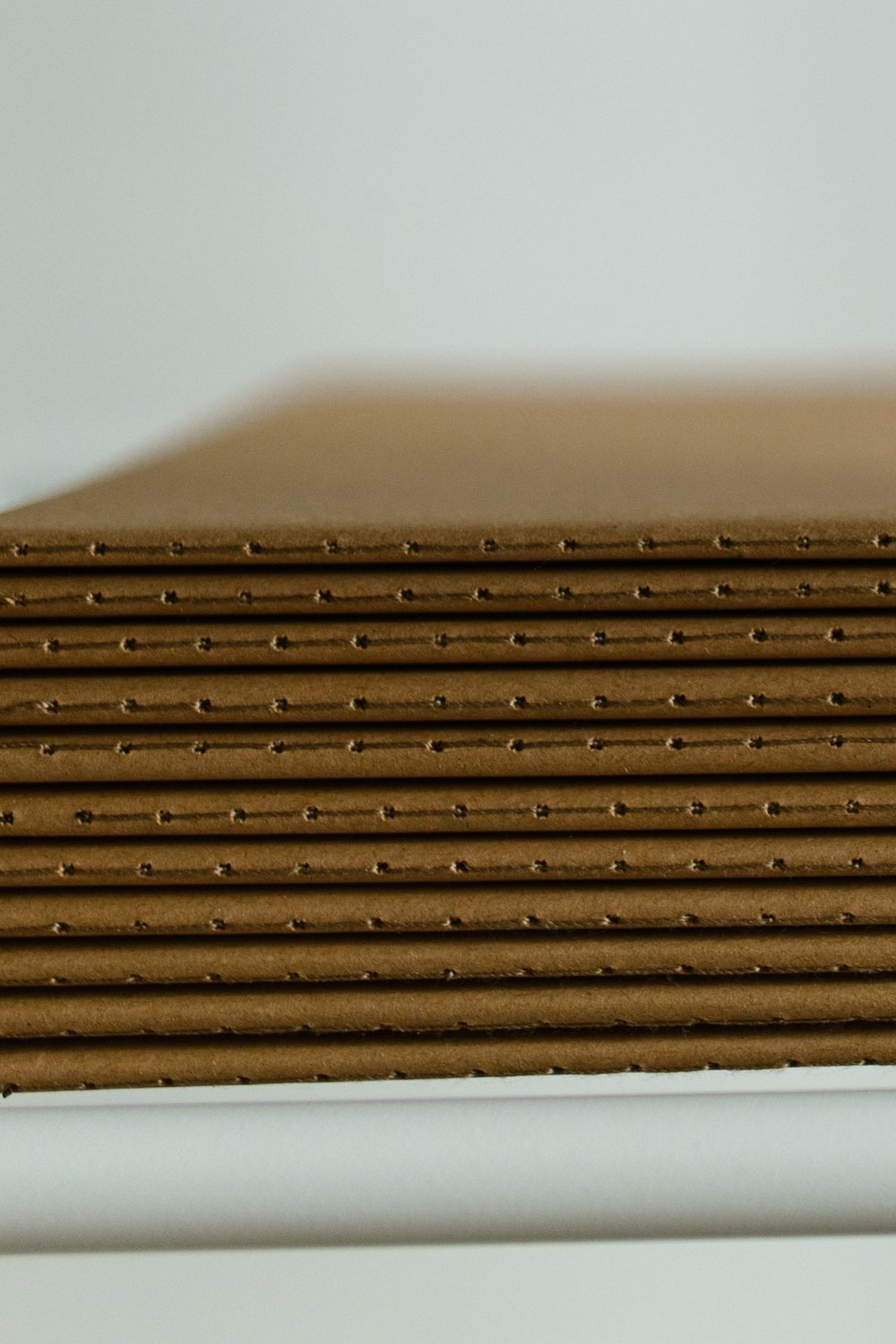 Minimalist Cardboard Shelf With Hidden Cable Routing - cardboard crafts diy ideas