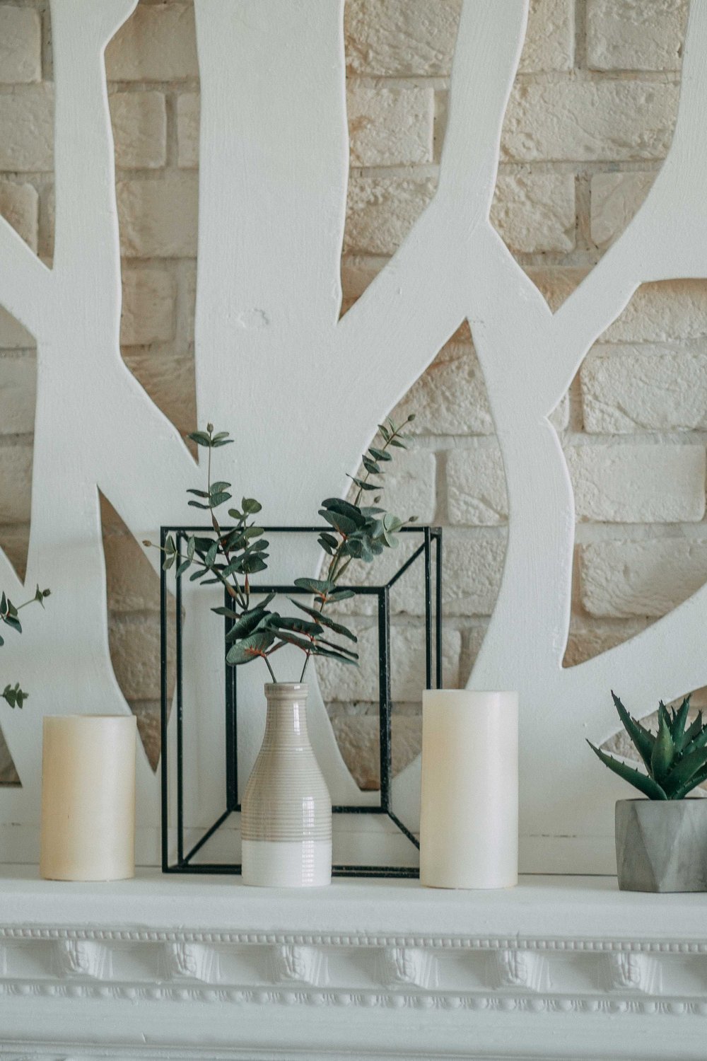 5. Spooky Skull and Candle Mantelpiece Vignettes - halloween party decorationst