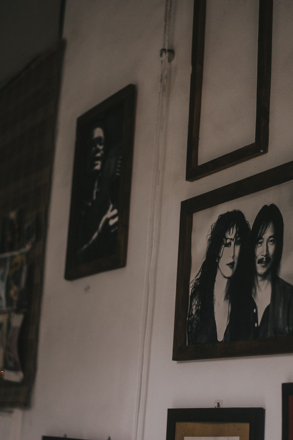 8. Haunted Portrait Gallery Wall - halloween party decorationst