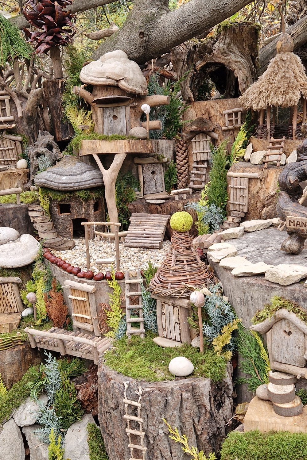 1. Mossy Hollow Log Fairy Village — Nature Does Half the Work - outdoor fairy garden diy