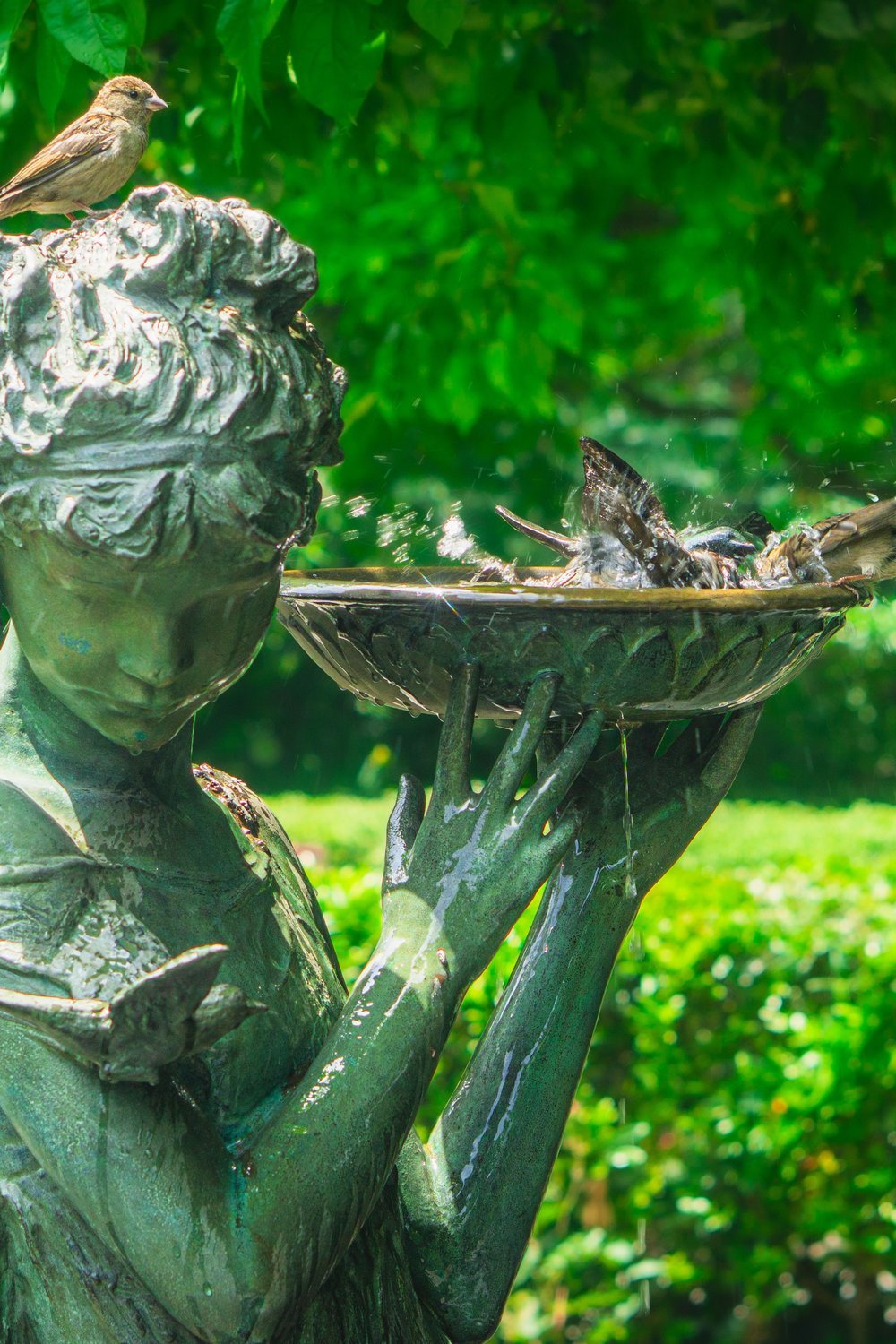 16. Repurposed Bird Bath Transformed Into a Fairy Oasis - outdoor fairy garden diy
