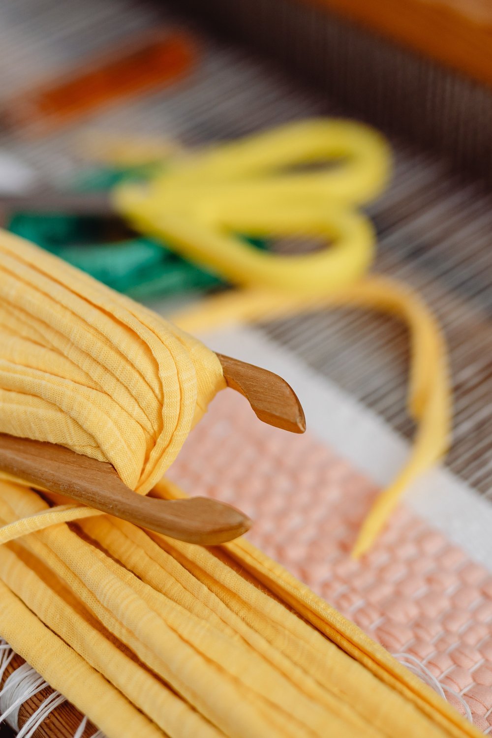 18. Paper Plate Weaving Project for Developing Fine Motor Skills - paper plate crafts for kids