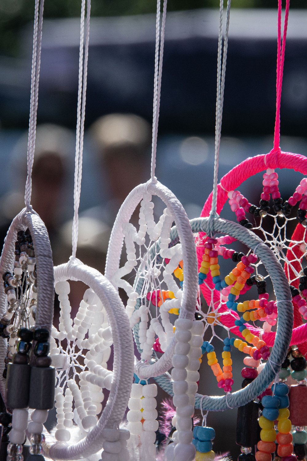 Yarn-Wrapped Dreamcatcher-Style Suncatcher with Beaded Center - suncatcher diy
